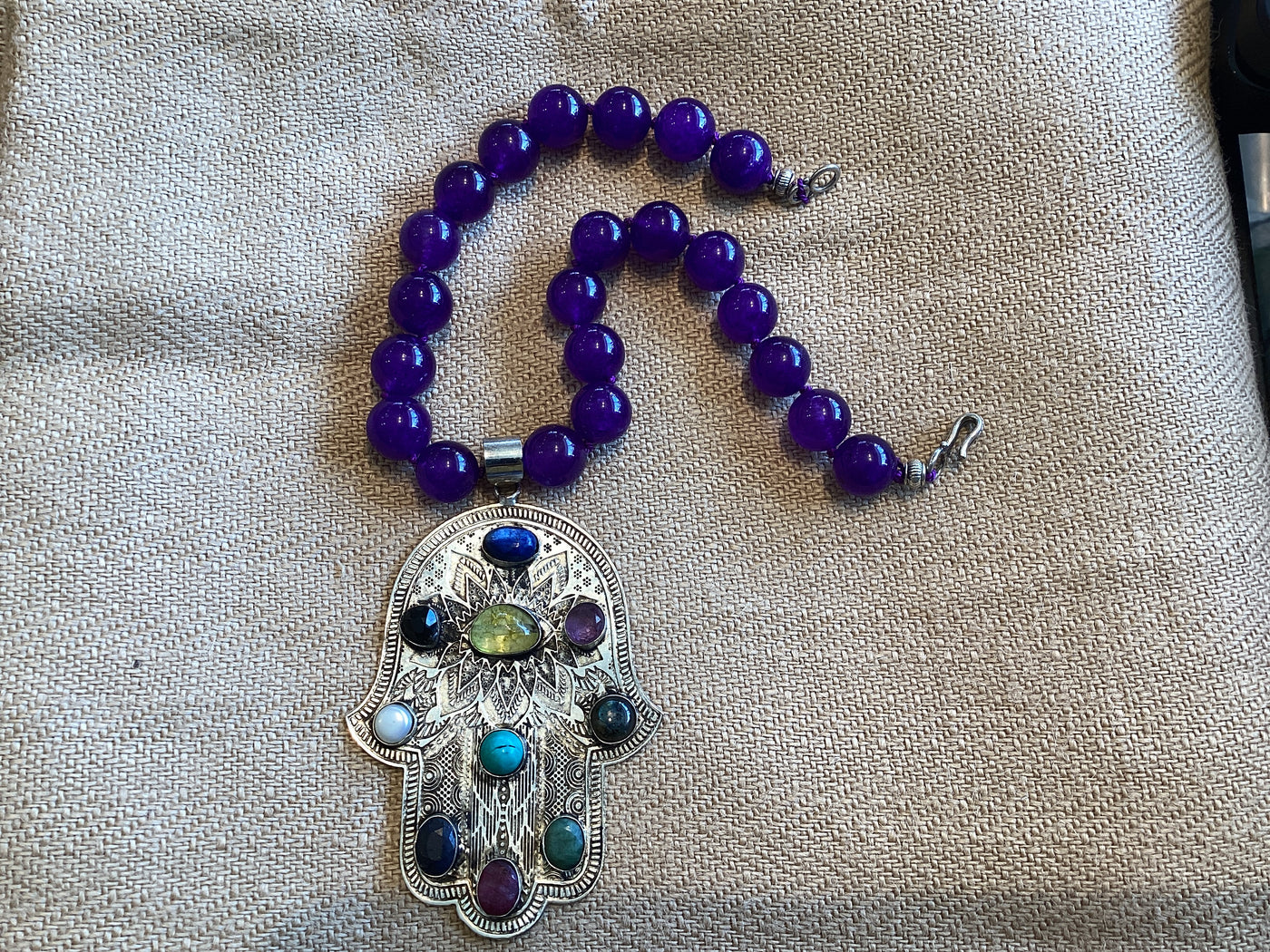 Purple amethyst necklace with Hand of Hamsa pendant by Dallas