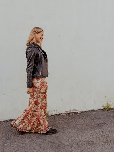 Floral Print Micro Mesh Maxi Skirt with scalled trimming. Fully lined.