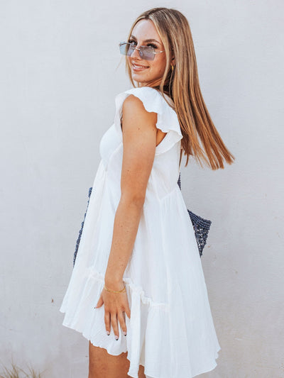 Whispering Waves Ruffle Dress by 75
