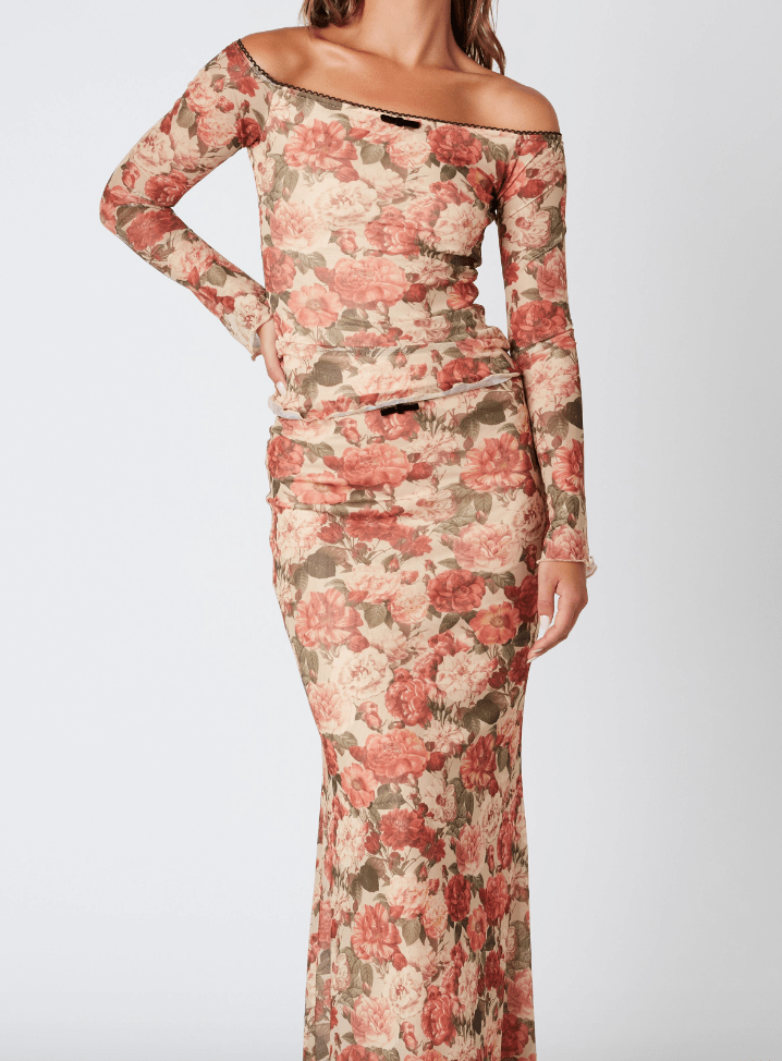 Floral Print Micro Mesh Maxi Skirt with scalled trimming. Fully lined.