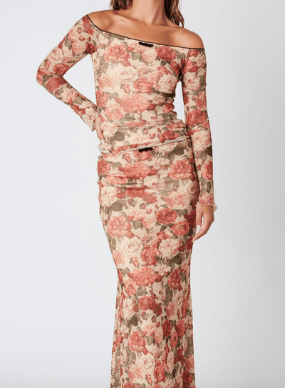 Floral Print Micro Mesh Maxi Skirt with scalled trimming. Fully lined.