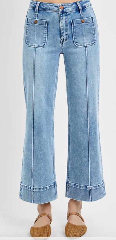 Light blue jeans with a white background