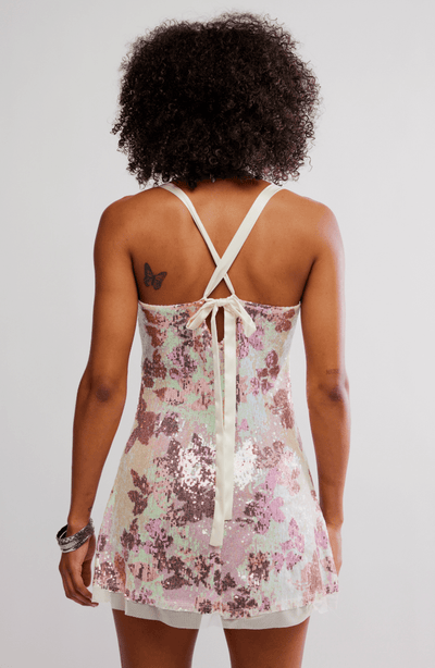 DAZZLE ME SEQUIN JACQUARD MINI SLIP BY FREE PEOPLE